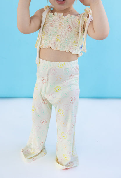 PASTEL SMILES DREAM SMOCKED FLARE SET