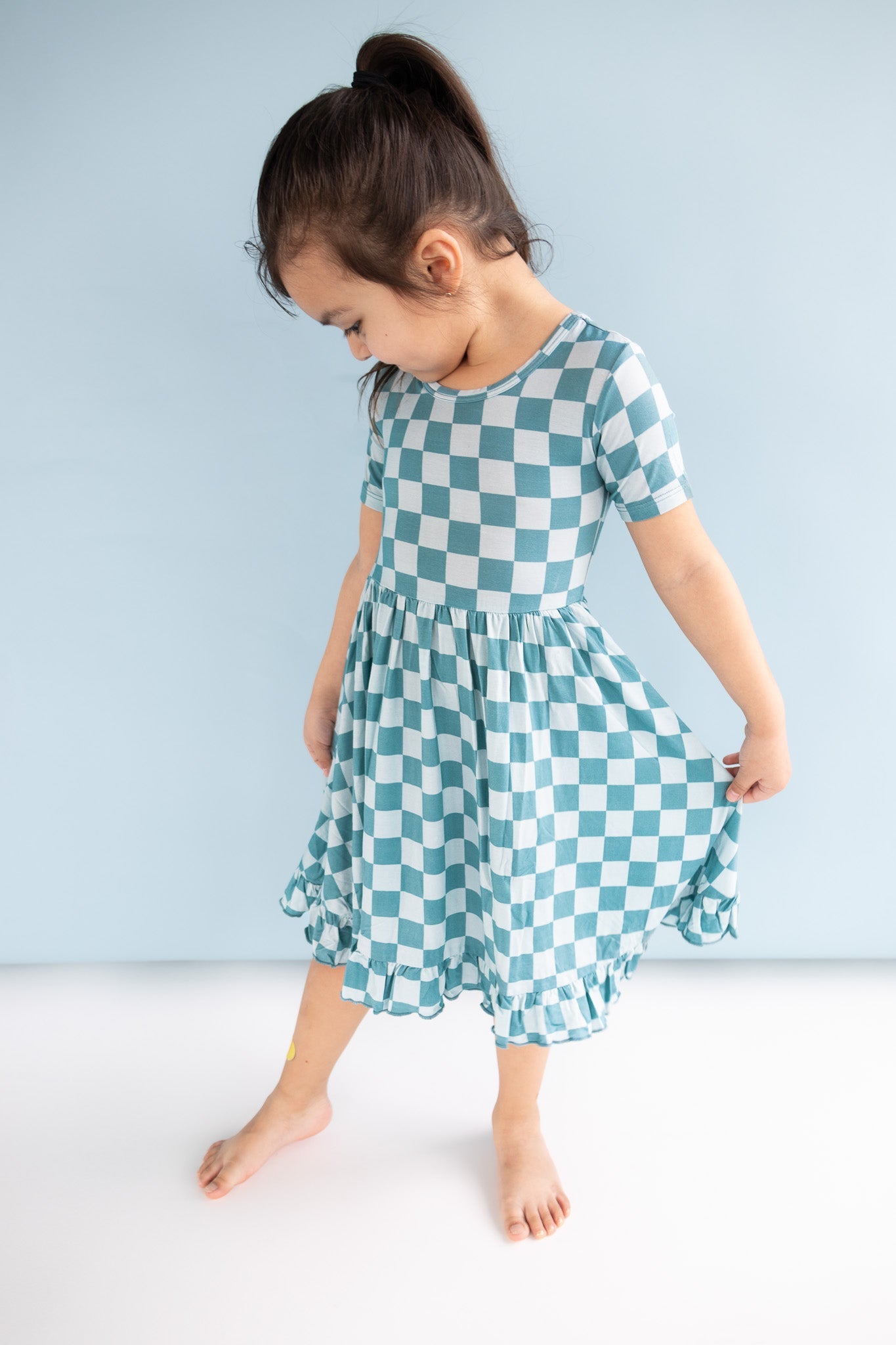 STORMY CHECKERS DREAM RUFFLE DRESS