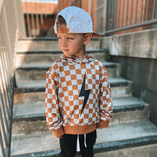 THE CHECKERED SPARK HOODIE - RUST