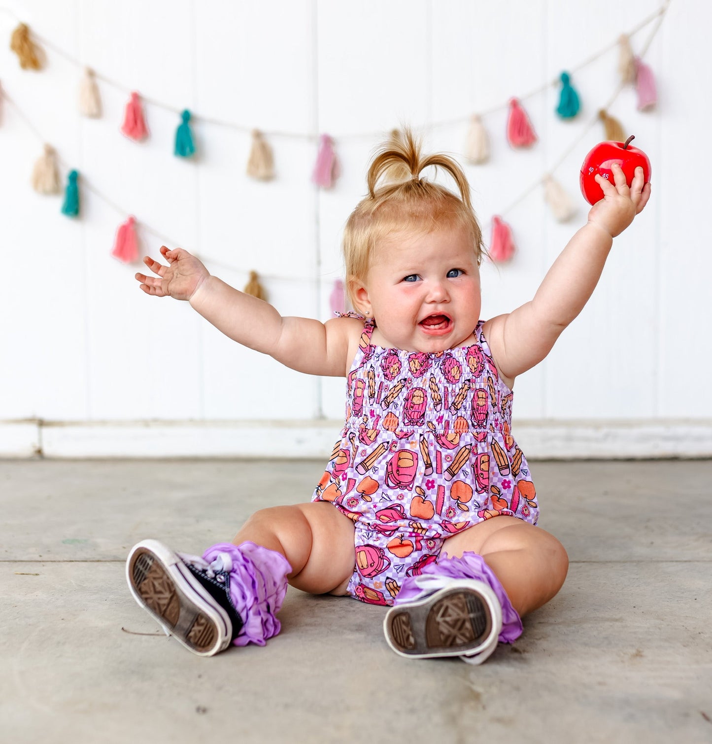 RULE THE SCHOOL SMOCKED BUBBLE ROMPER