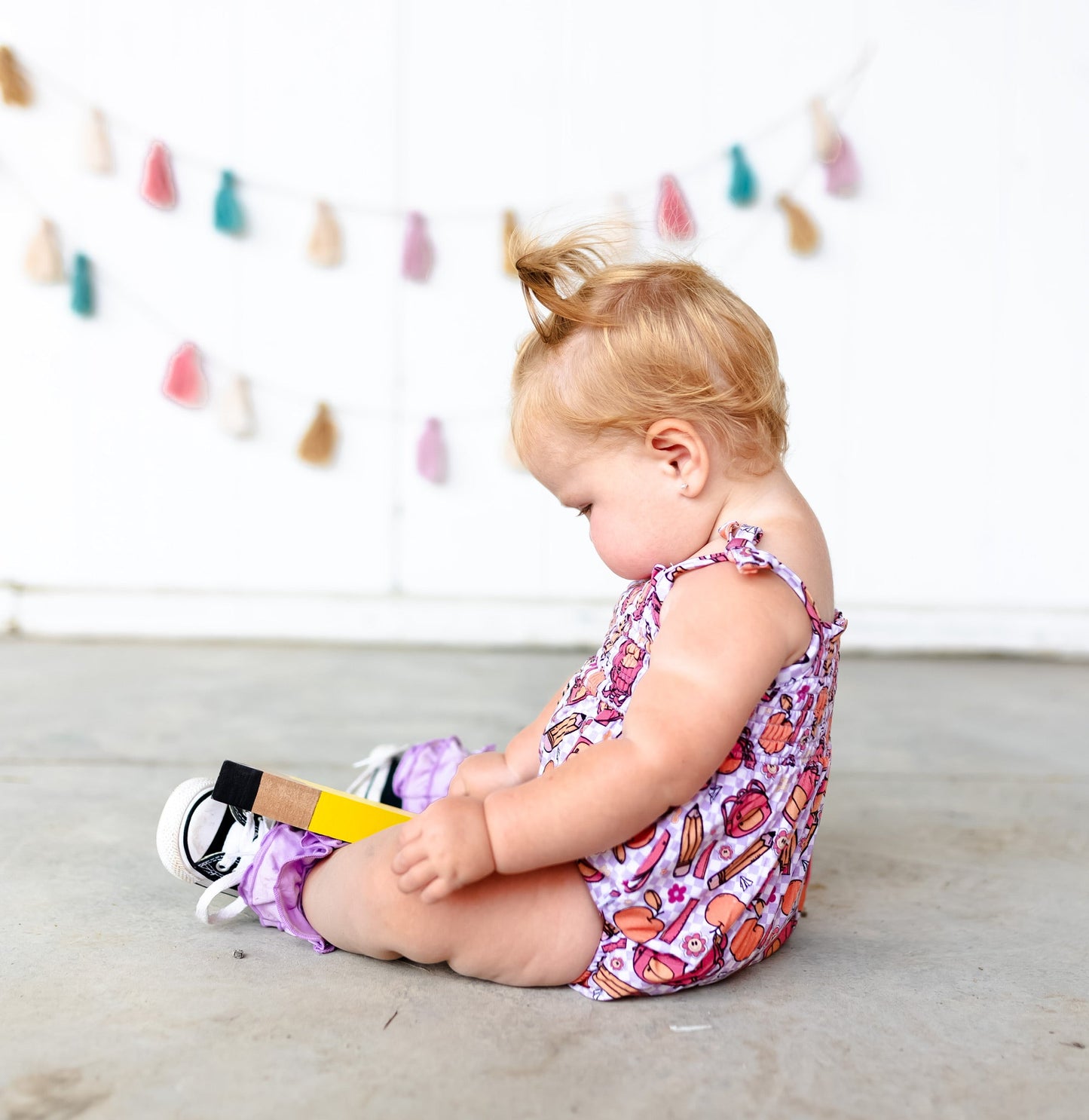 RULE THE SCHOOL SMOCKED BUBBLE ROMPER