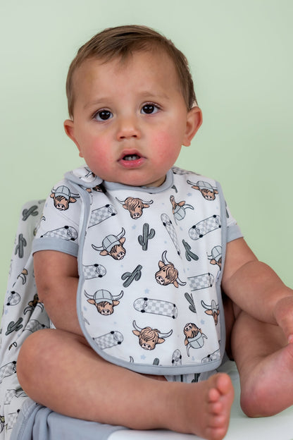 EXCLUSIVE MOO-VING FAST DREAM BABY BIB