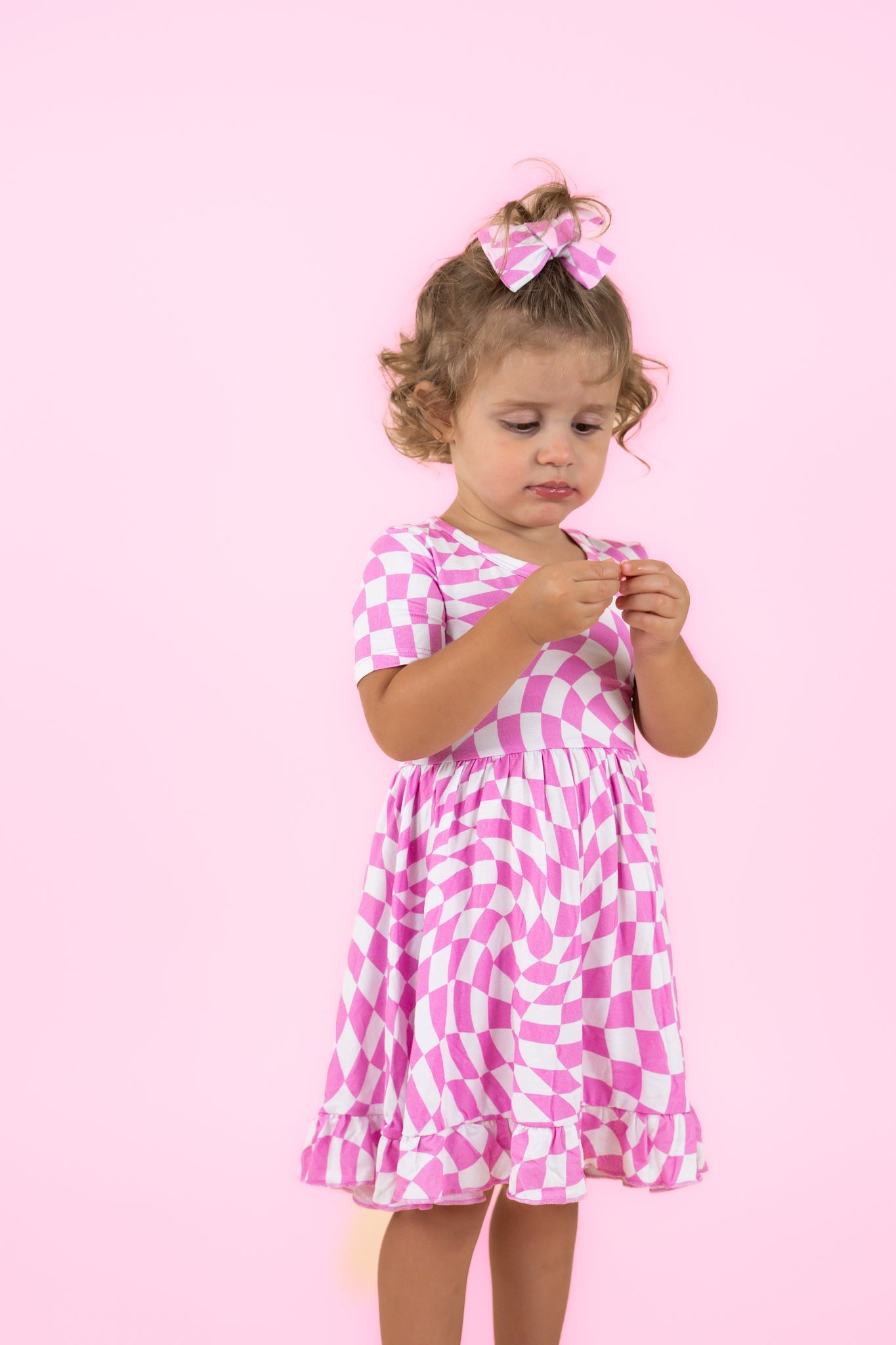 BUBBLEGUM WAVY CHECKERS DREAM RUFFLE DRESS