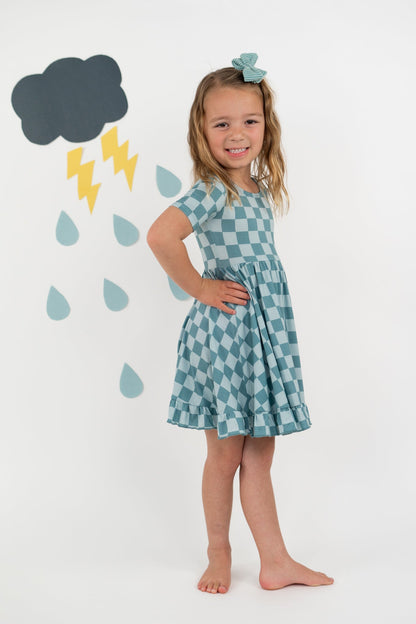 STORMY CHECKERS DREAM RUFFLE DRESS