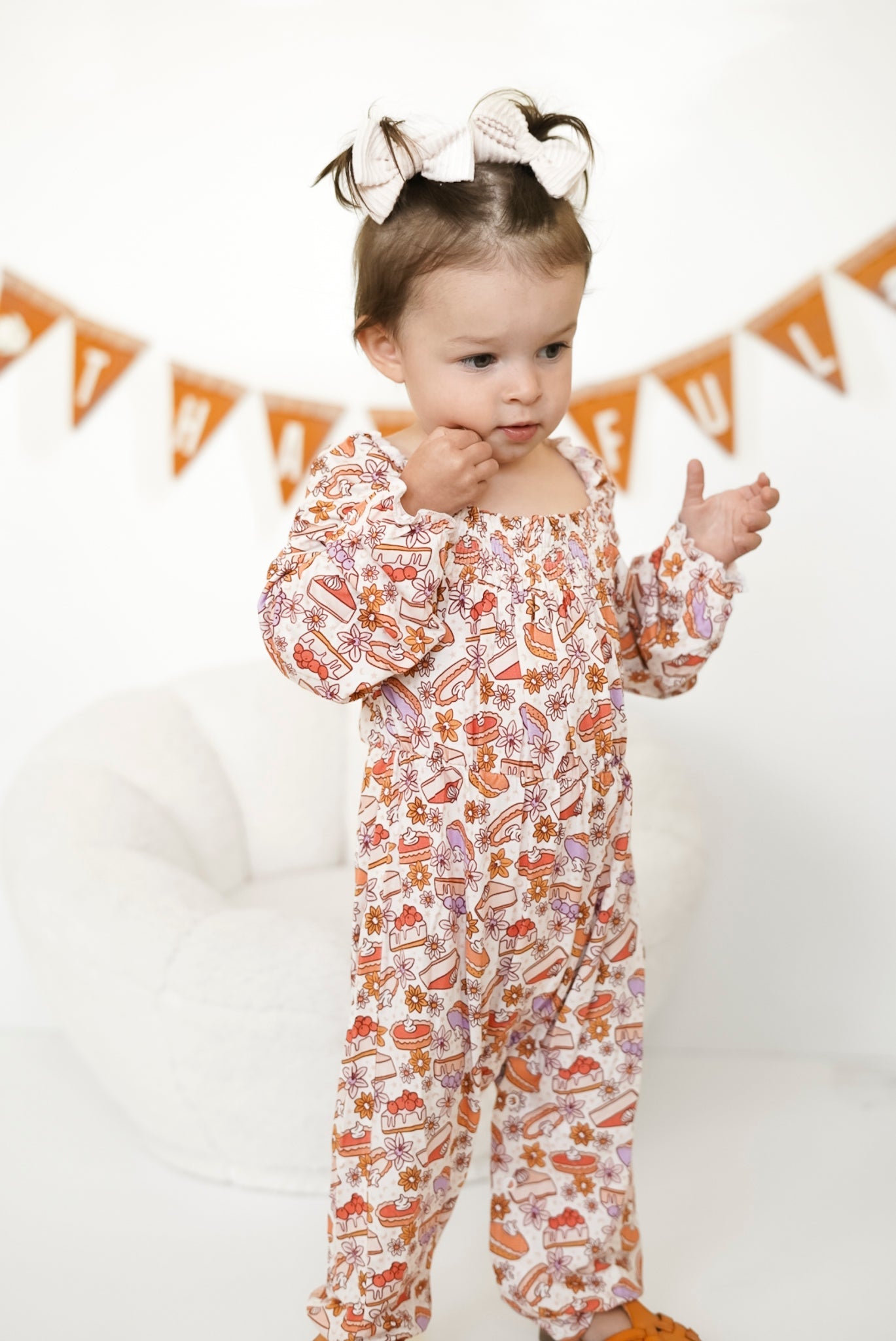 CUTE AS PIE DREAM SMOCKED JUMPSUIT