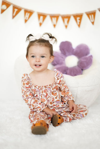 CUTE AS PIE DREAM SMOCKED JUMPSUIT