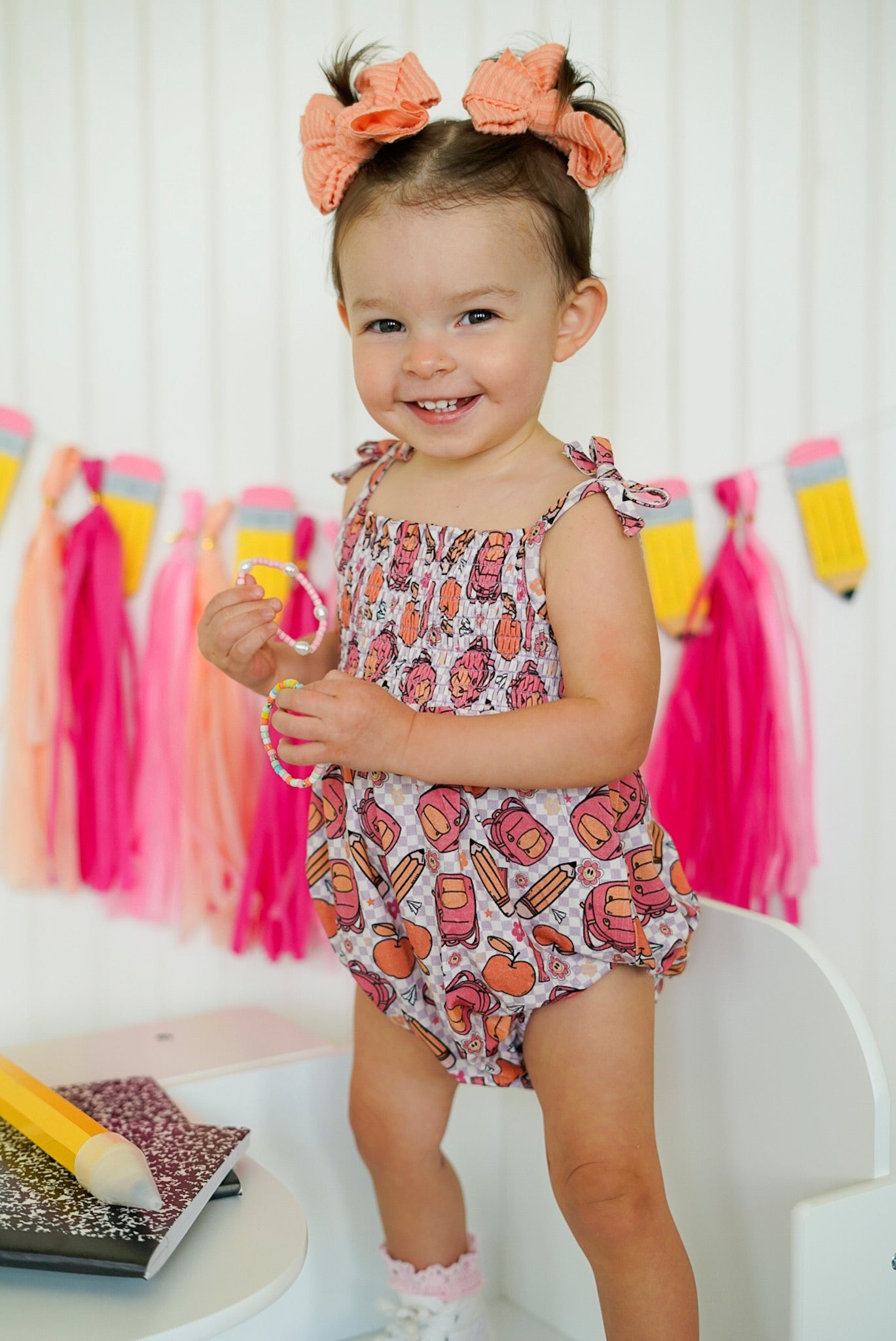 RULE THE SCHOOL SMOCKED BUBBLE ROMPER