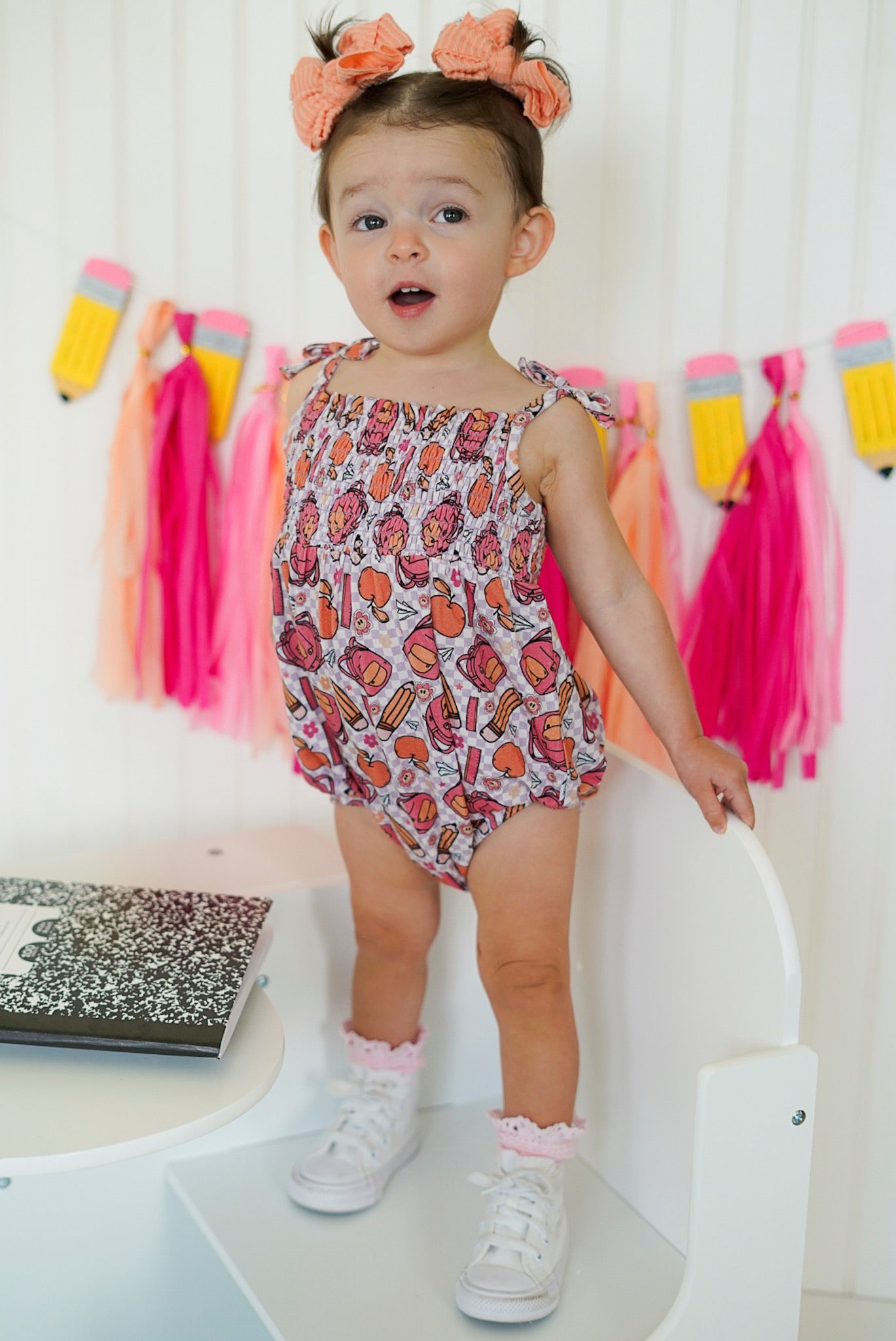 RULE THE SCHOOL SMOCKED BUBBLE ROMPER