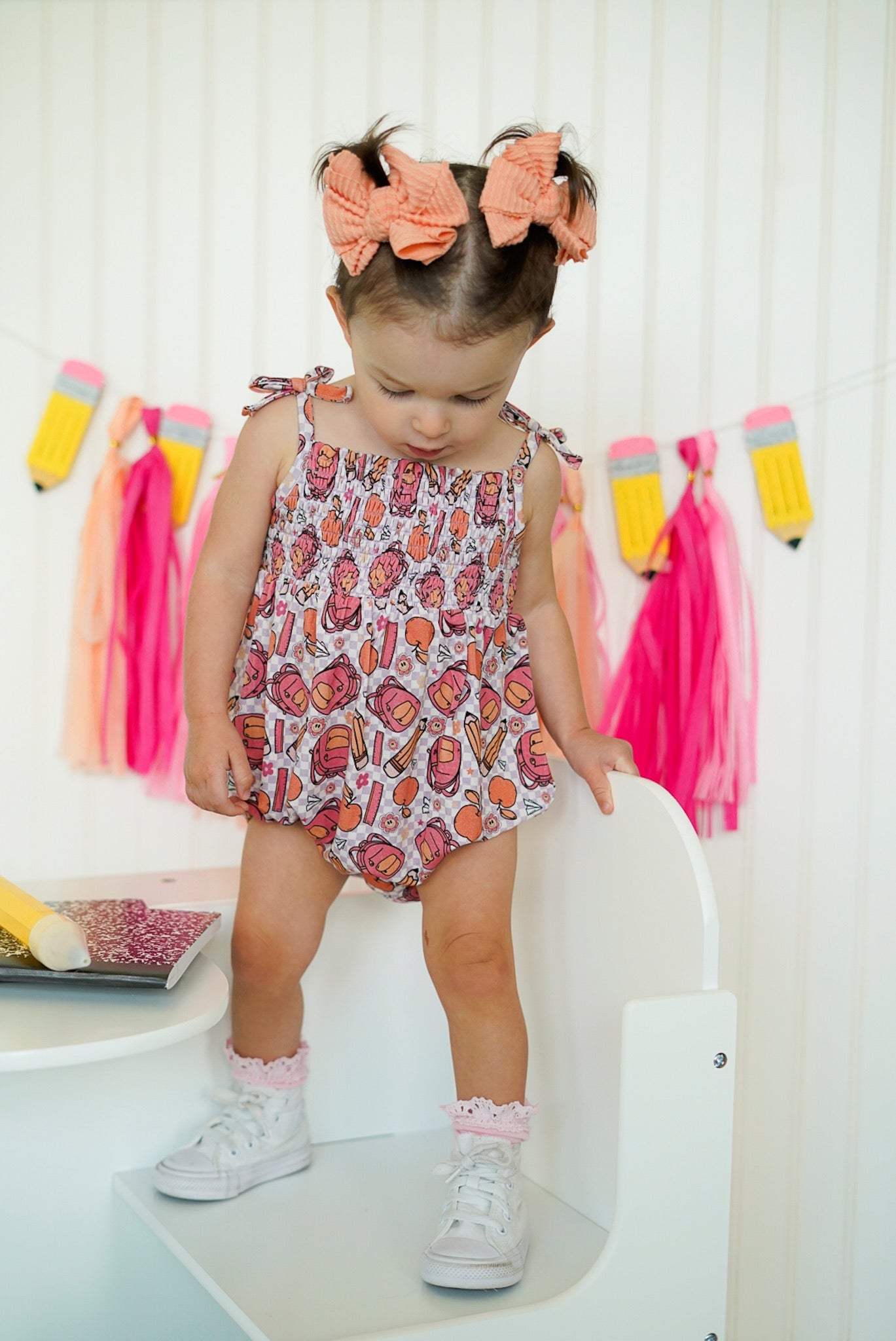 RULE THE SCHOOL SMOCKED BUBBLE ROMPER