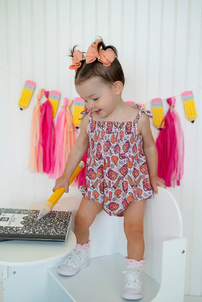 RULE THE SCHOOL SMOCKED BUBBLE ROMPER