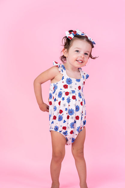 EXCLUSIVE FREEDOM BLOOMS DREAM BUBBLE ROMPER