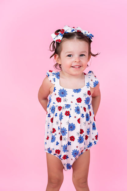 EXCLUSIVE FREEDOM BLOOMS DREAM BUBBLE ROMPER