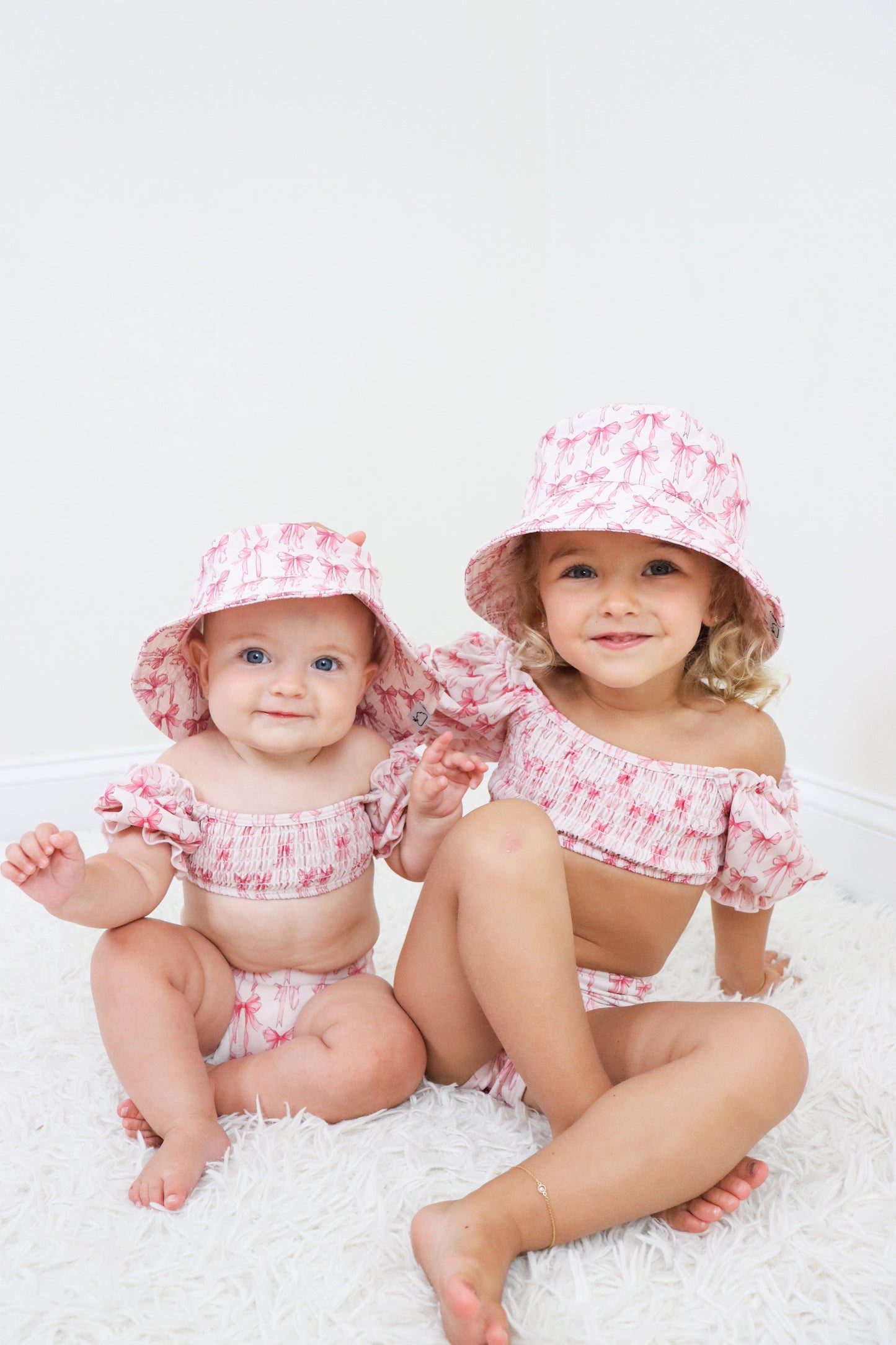 BOW CUTE DREAM SMOCKED OFF THE SHOULDER SWIM SUIT