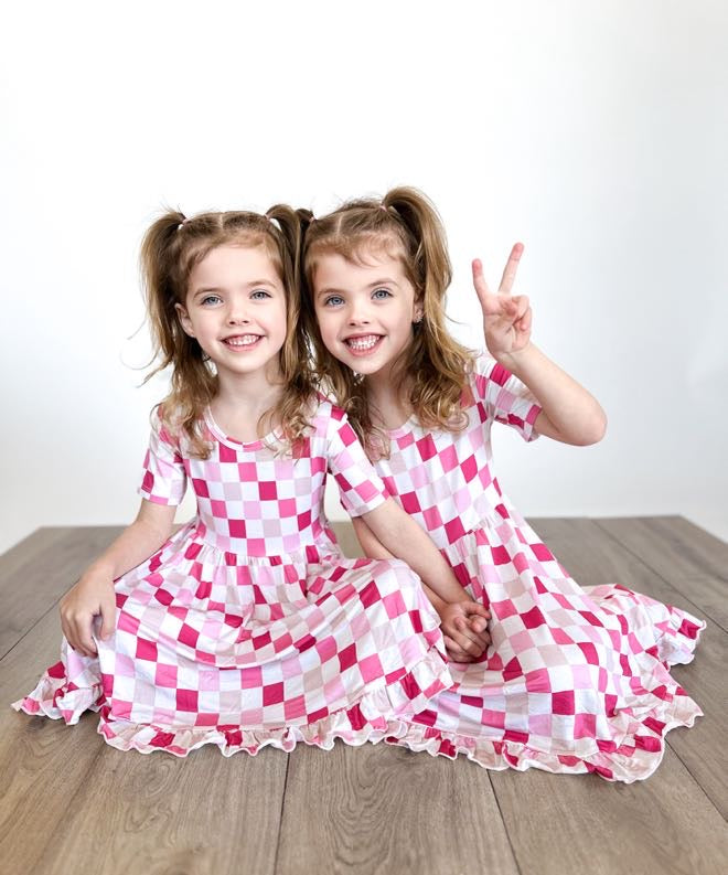 DREAMY PINK CHECKERS DREAM RUFFLE DRESS