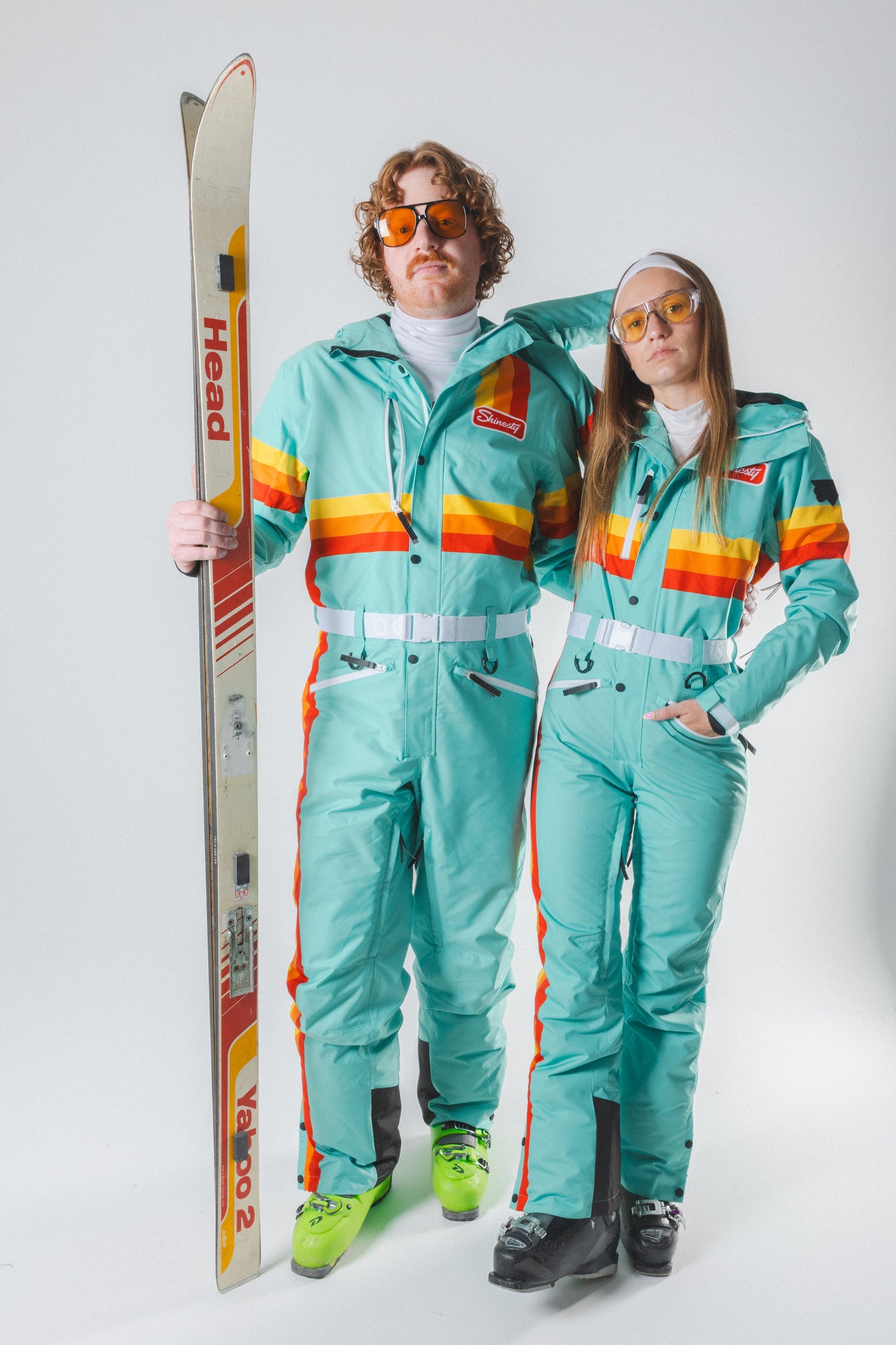 The Midday Aprés | Teal and Orange Retro Stripe Women's One Piece Ski Suit