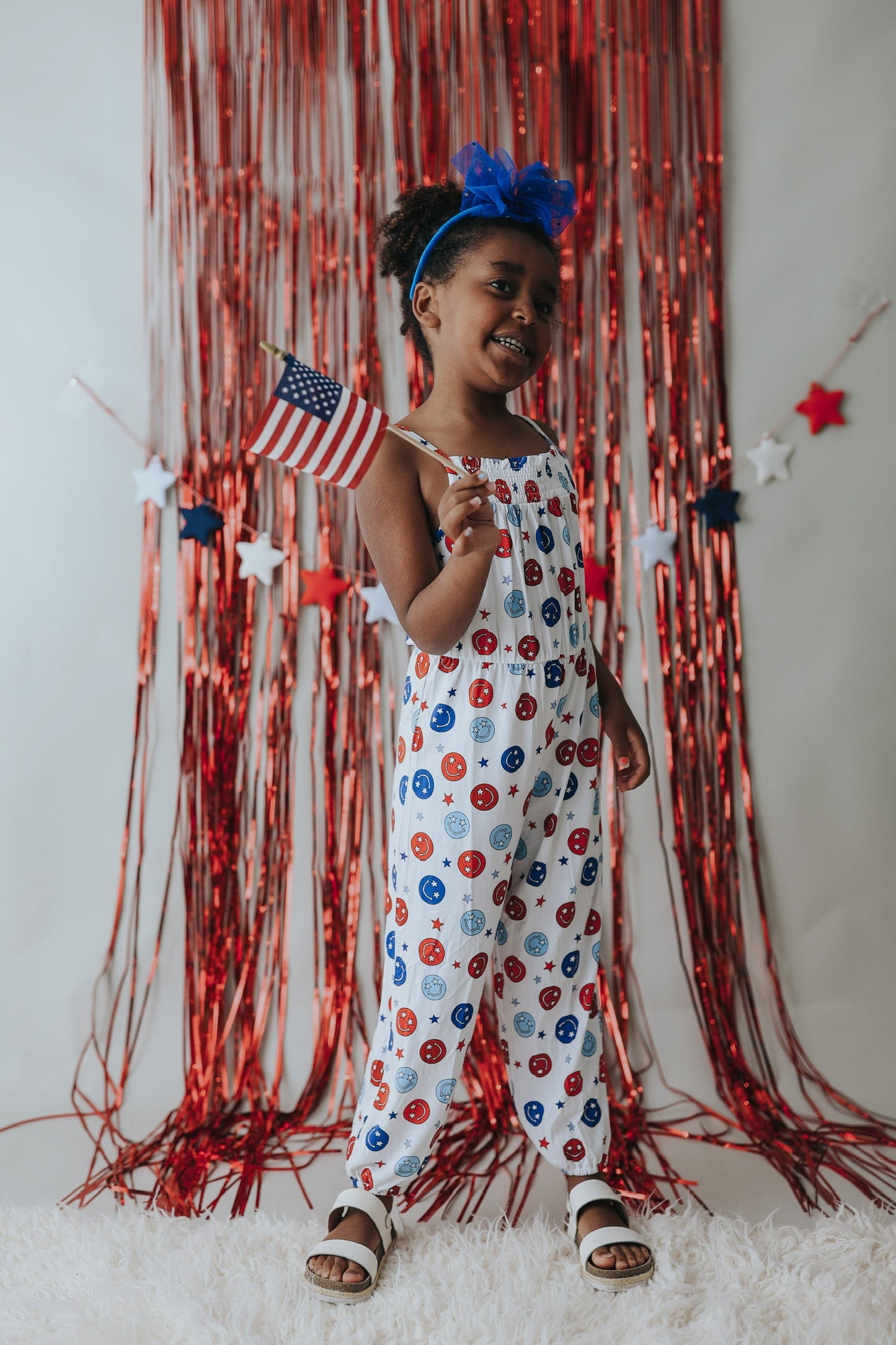 STAR SPANGLED SMILES DREAM SMOCKED JUMPSUIT