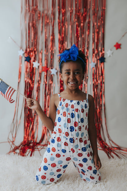 STAR SPANGLED SMILES DREAM SMOCKED JUMPSUIT