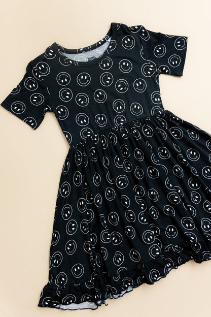 MIDNIGHT SMILES DREAM RUFFLE DRESS