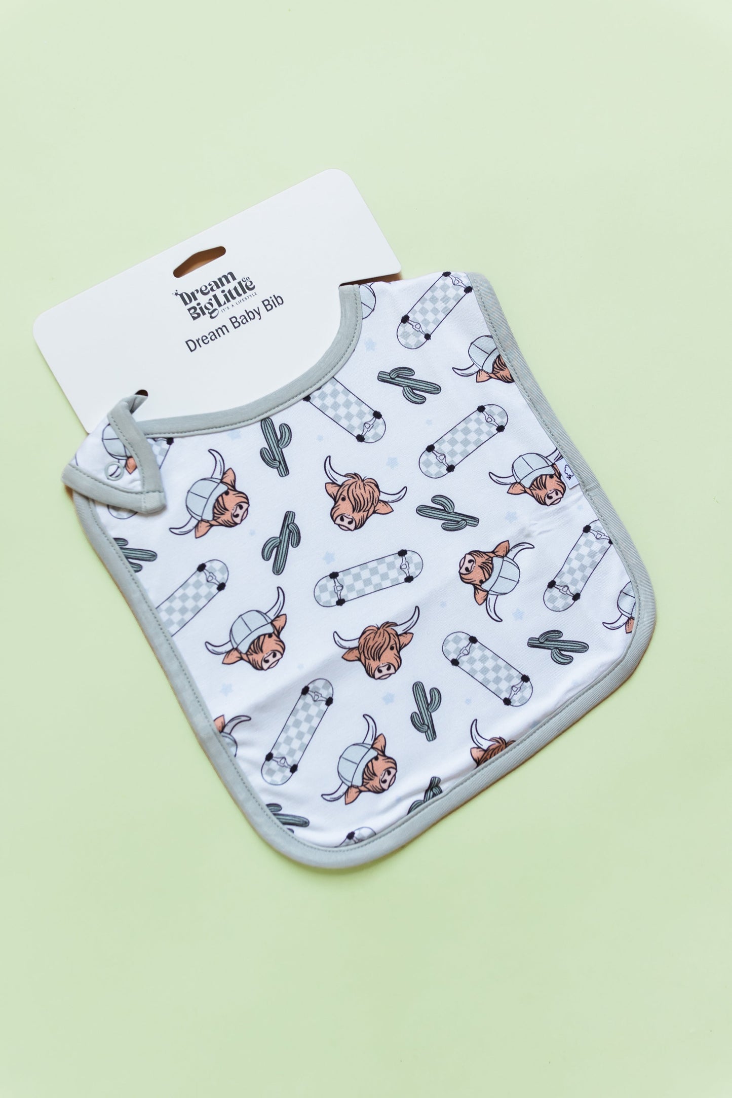 EXCLUSIVE MOO-VING FAST DREAM BABY BIB