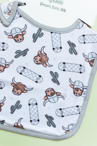 EXCLUSIVE MOO-VING FAST DREAM BABY BIB