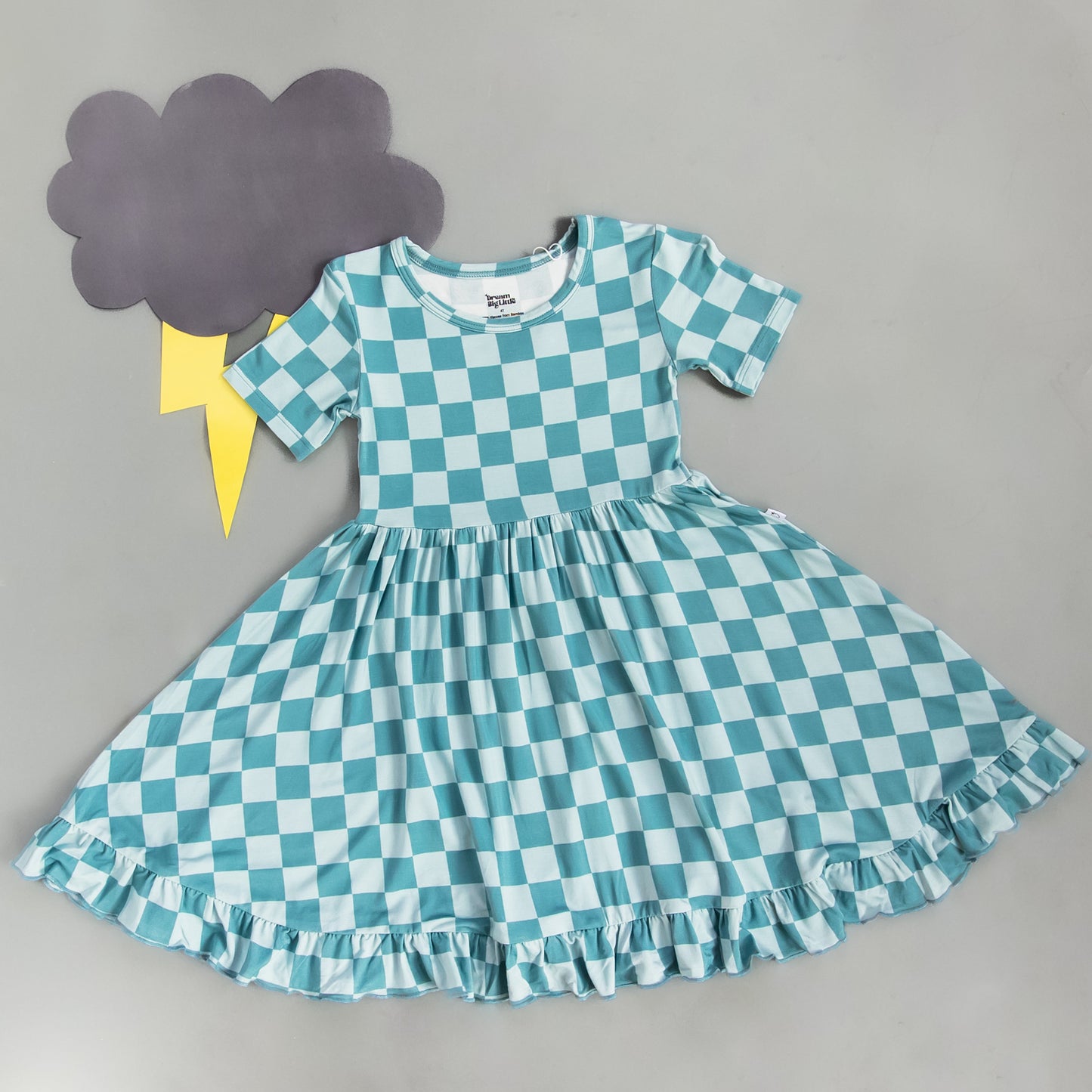 STORMY CHECKERS DREAM RUFFLE DRESS