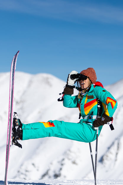 The Side Country Sender | Turquoise Striped Retro Women's One Piece Ski Suit